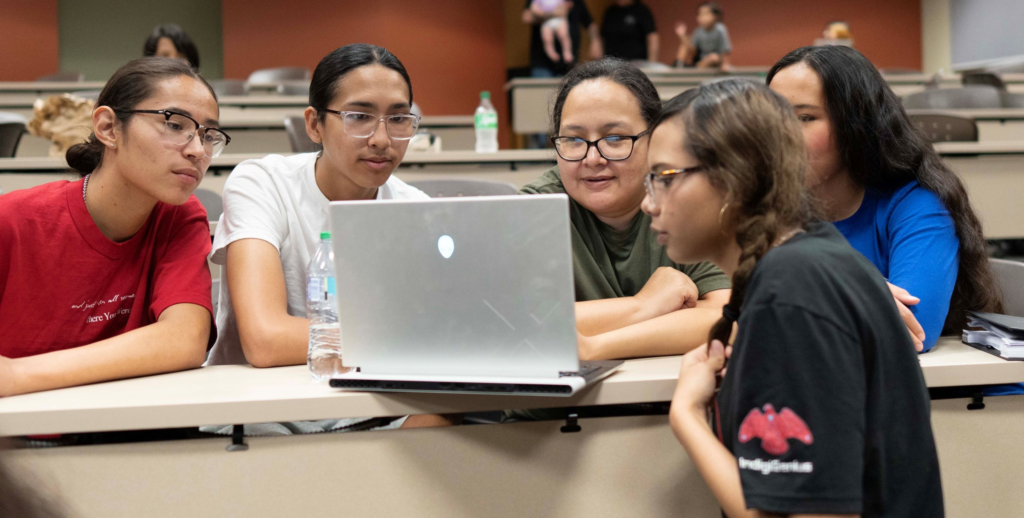 Photo of Student showing family app on computer